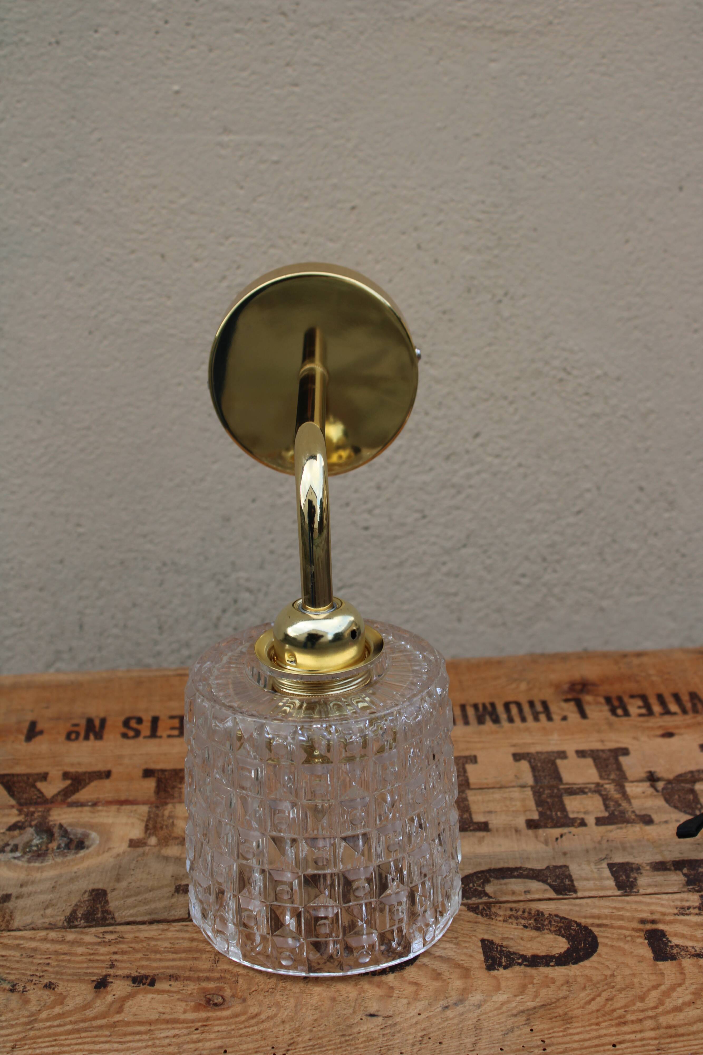 Brass and moulded glass sconce