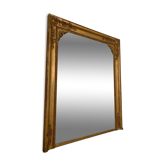 Nineteenth century mirror in wood and stucco gilded with rich gold leaf ornamentation, 101x127 cm