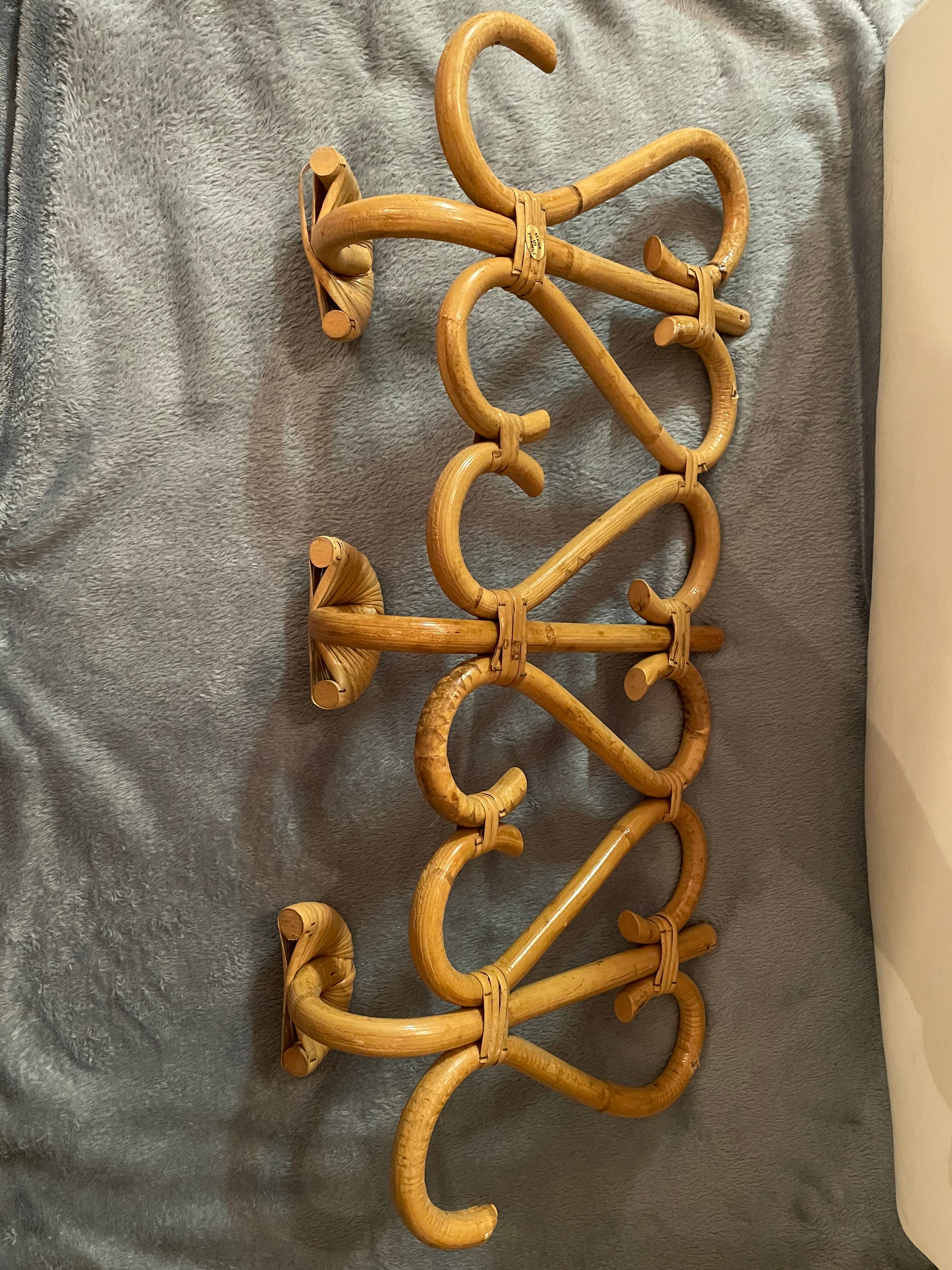 Vintage rattan wall coat holder with 3 pateres