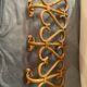 Vintage rattan wall coat holder with 3 pateres