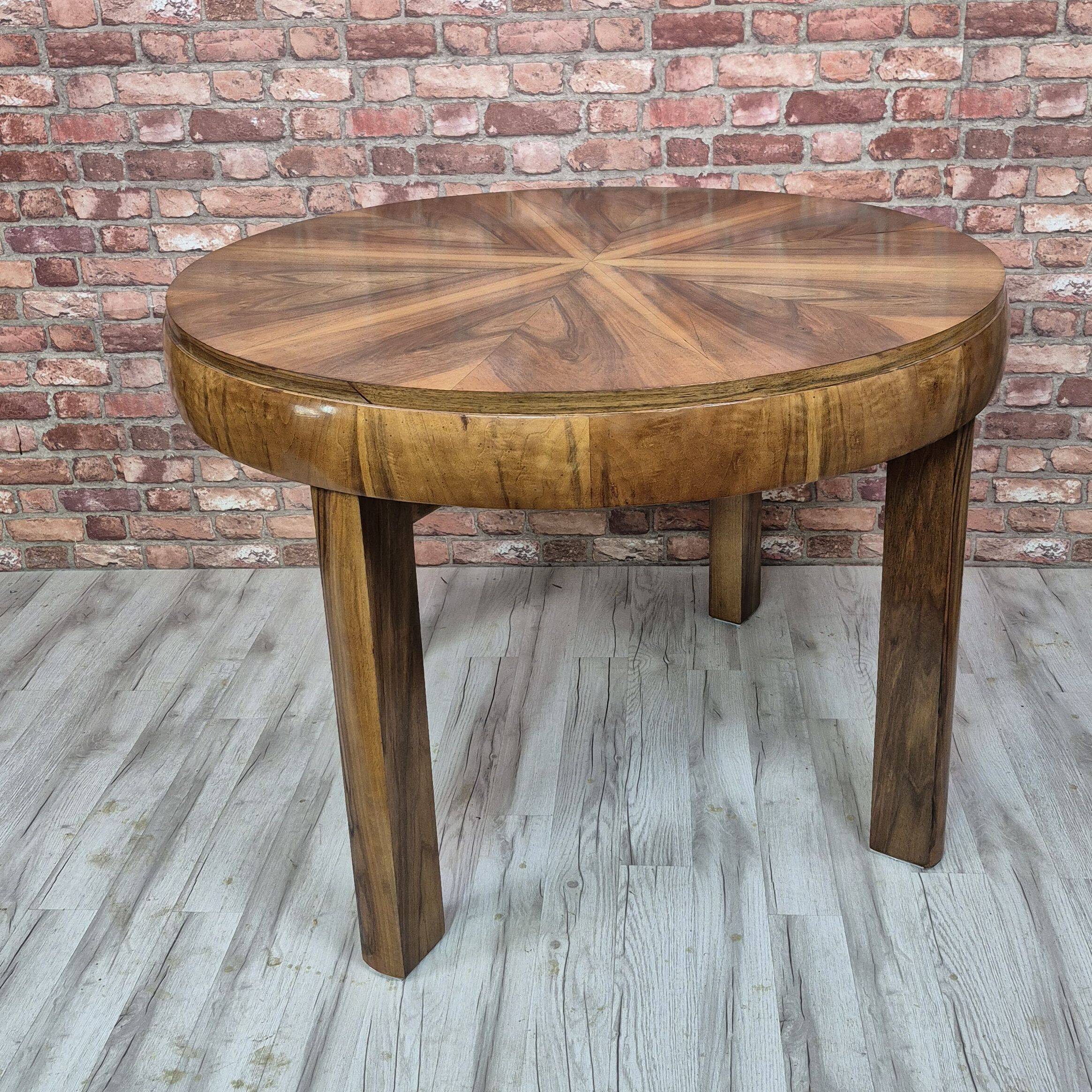 Walnut extendable round table after professional restoration. Art deco.