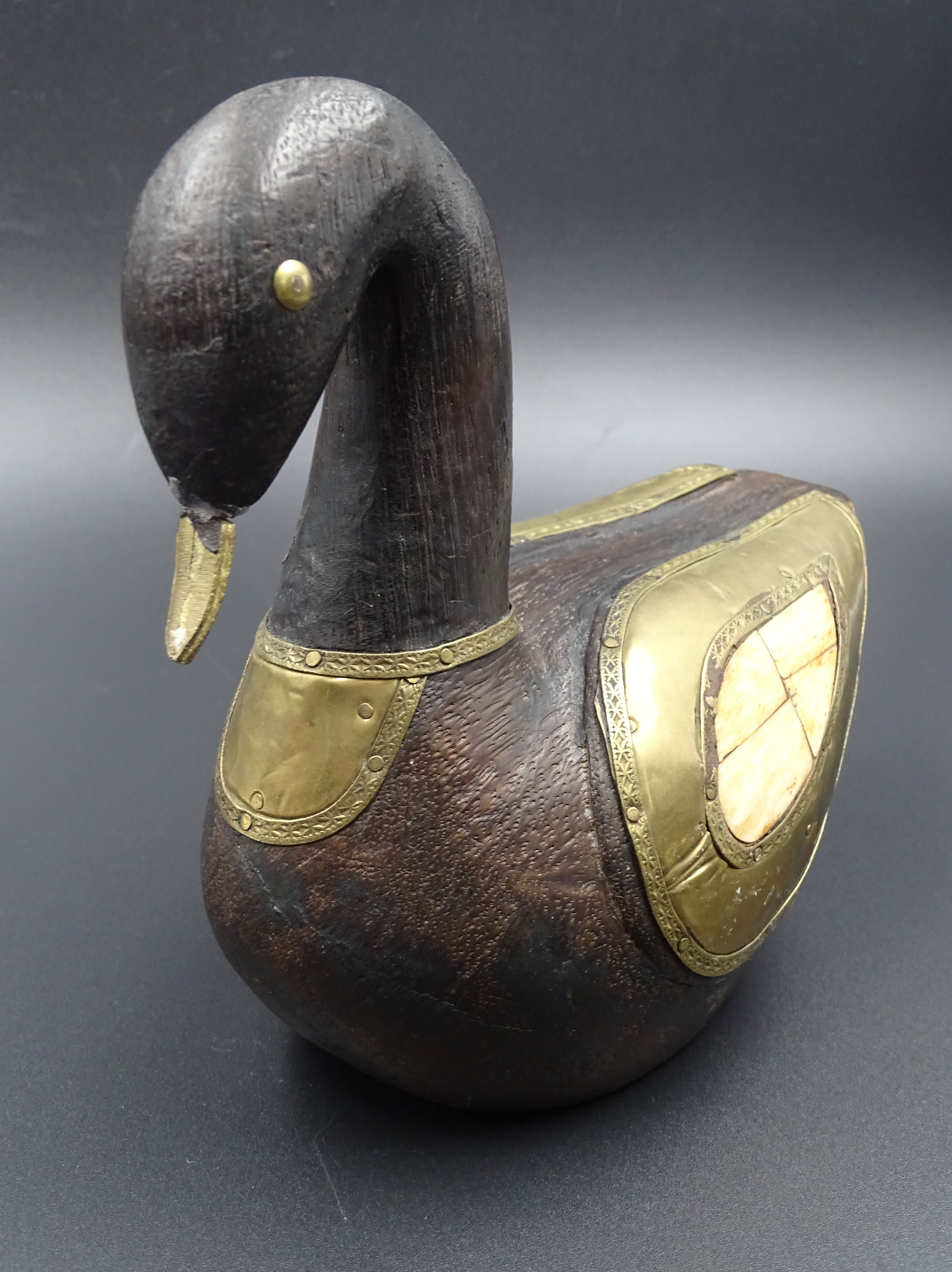 Wooden and brass swan