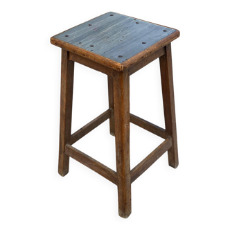 Tabouret d'atelier haut en bois foncé et lino gris bleu 60cm