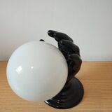 80s hand and globe wall light