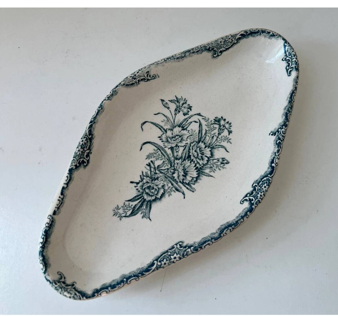 Antique Terre de Fer dish with carnation decoration from Clairefontaine