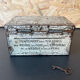 Old metal and wood medicine box with key