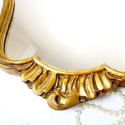 Baroque-style wall mirror / H49 cm x 30 cm /Decor shell and foliage / Golden with gold leaf