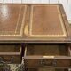 English mahogany pedestal desk with leather top from the 1950s