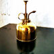 Brass spray