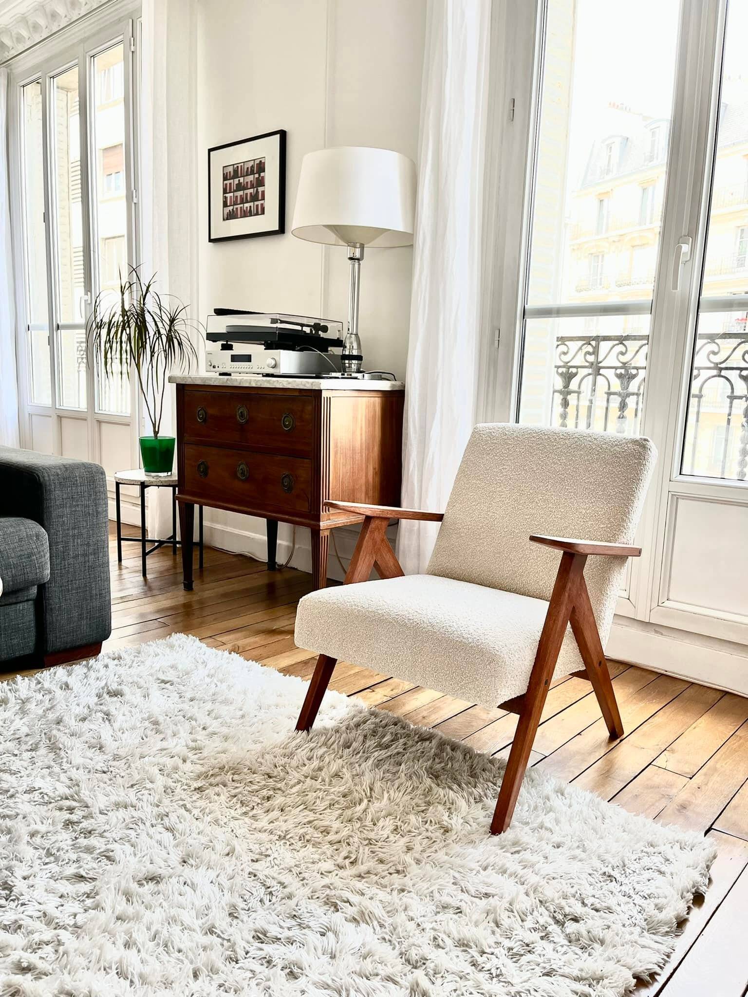 KOMPAS armchairs in grey and white.