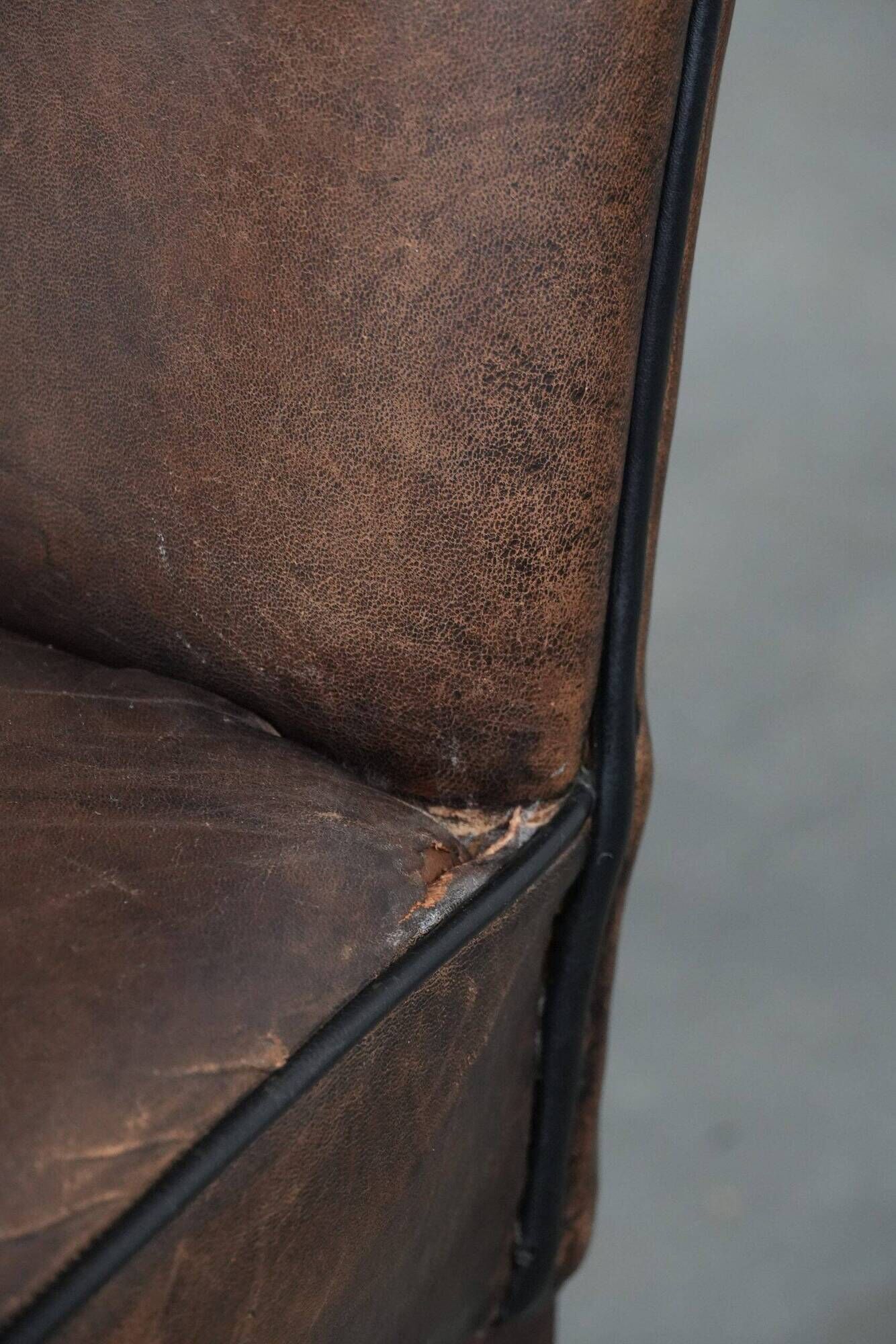 Set of 6 vintage sheepskin dining chairs finished with black piping