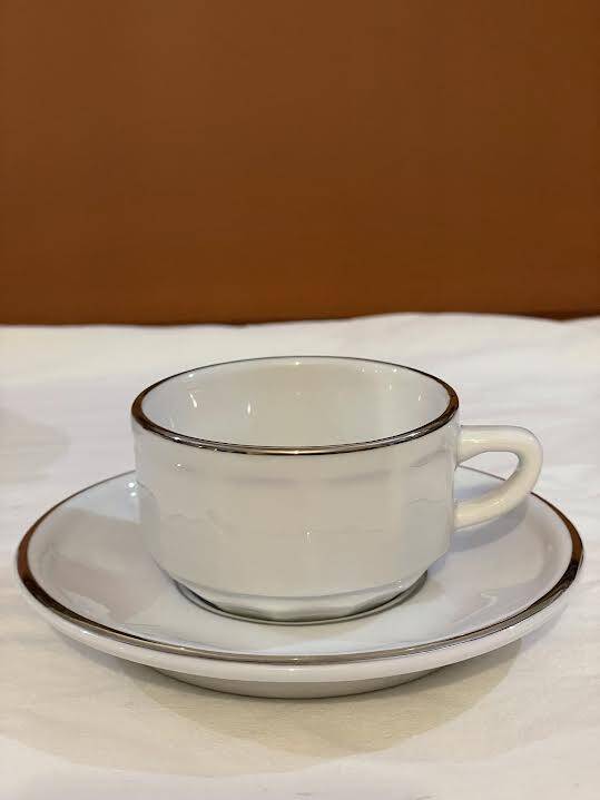 Four porcelain "bistro" cups and saucers
