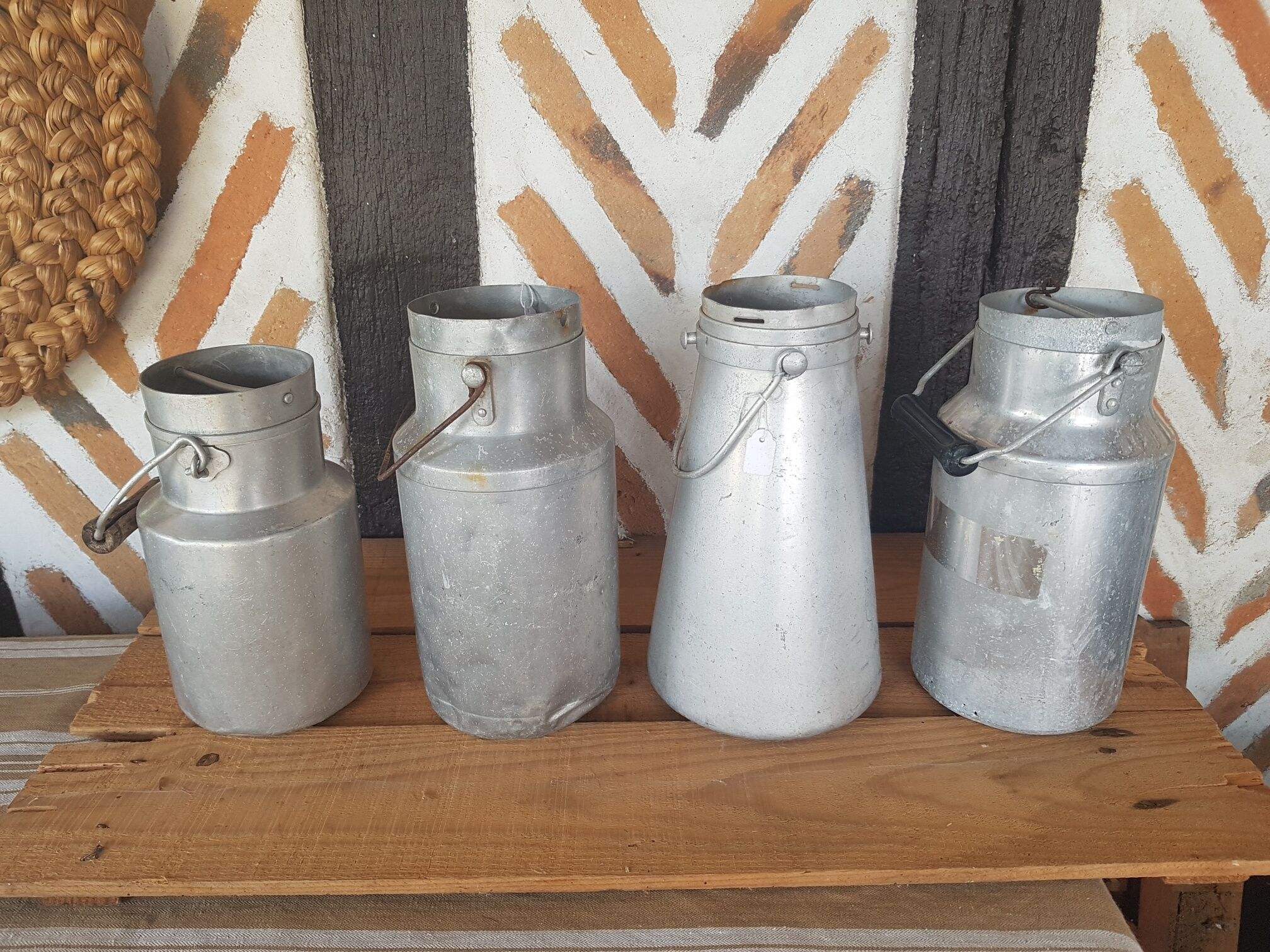 Set of 4 old metal milk canister jars