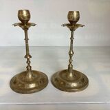 Pair of brass candlesticks with worked flower balls.