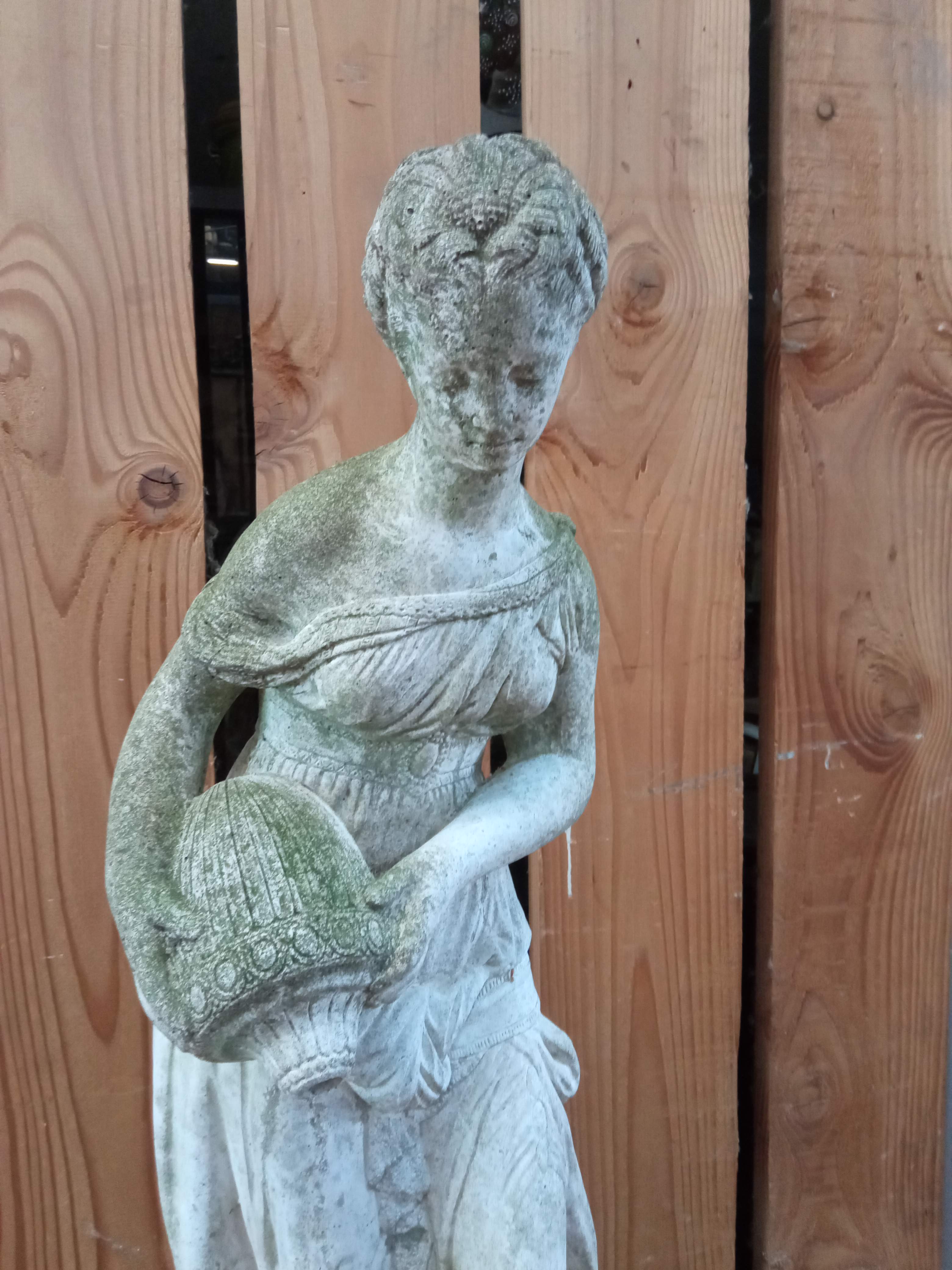 Reconstructed stone garden statue