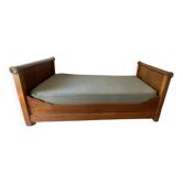 Walnut and bronze sleigh bed