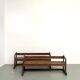 Pair of communal benches in solid oak, 1950s.