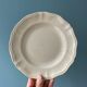 Set of 11 flat earthenware plates from Sarreguemines France