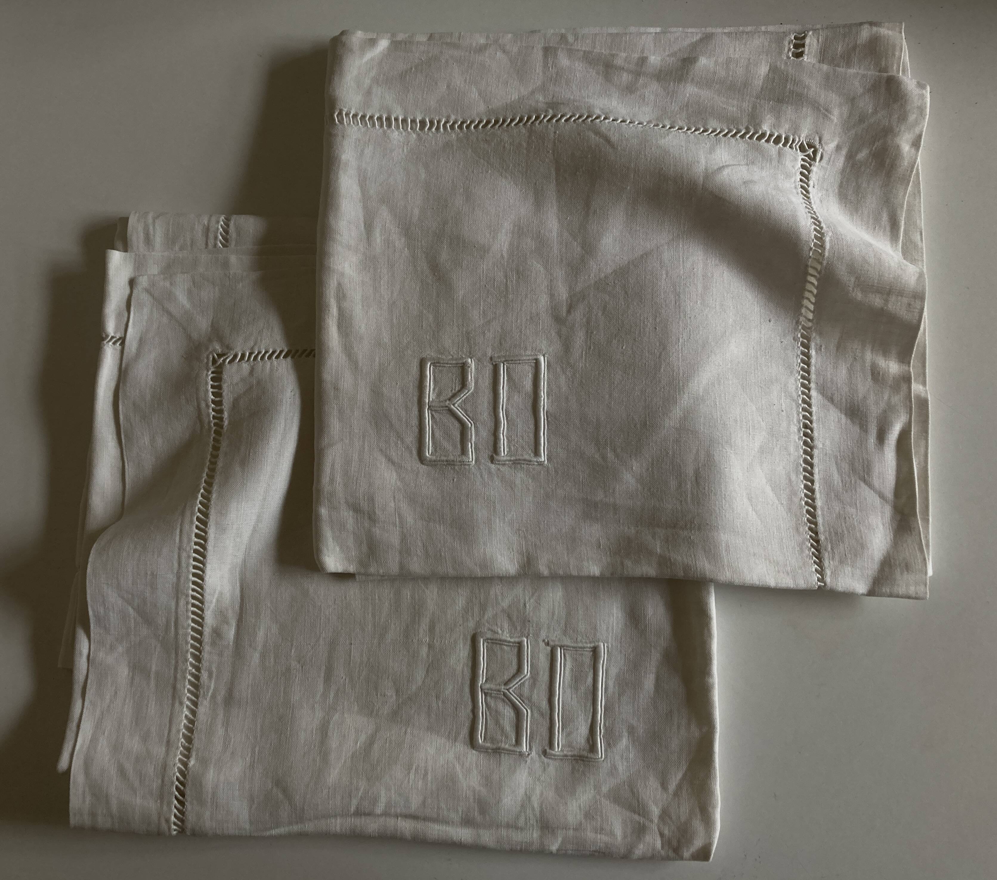 Pair of modernist linen pillowcases embroidered with comic strips