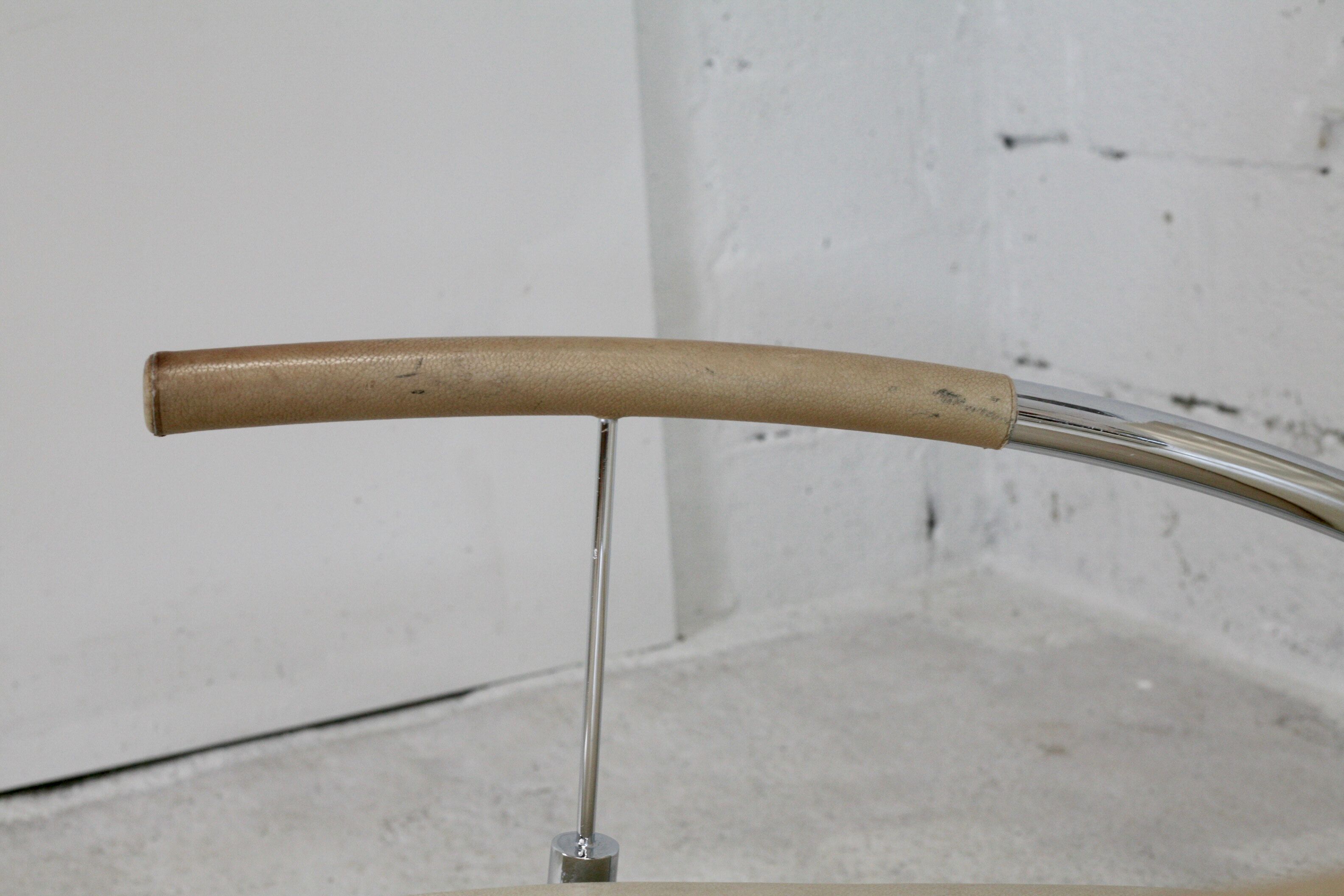 Tubular steel armchair and "cream" leather, France, circa 1970