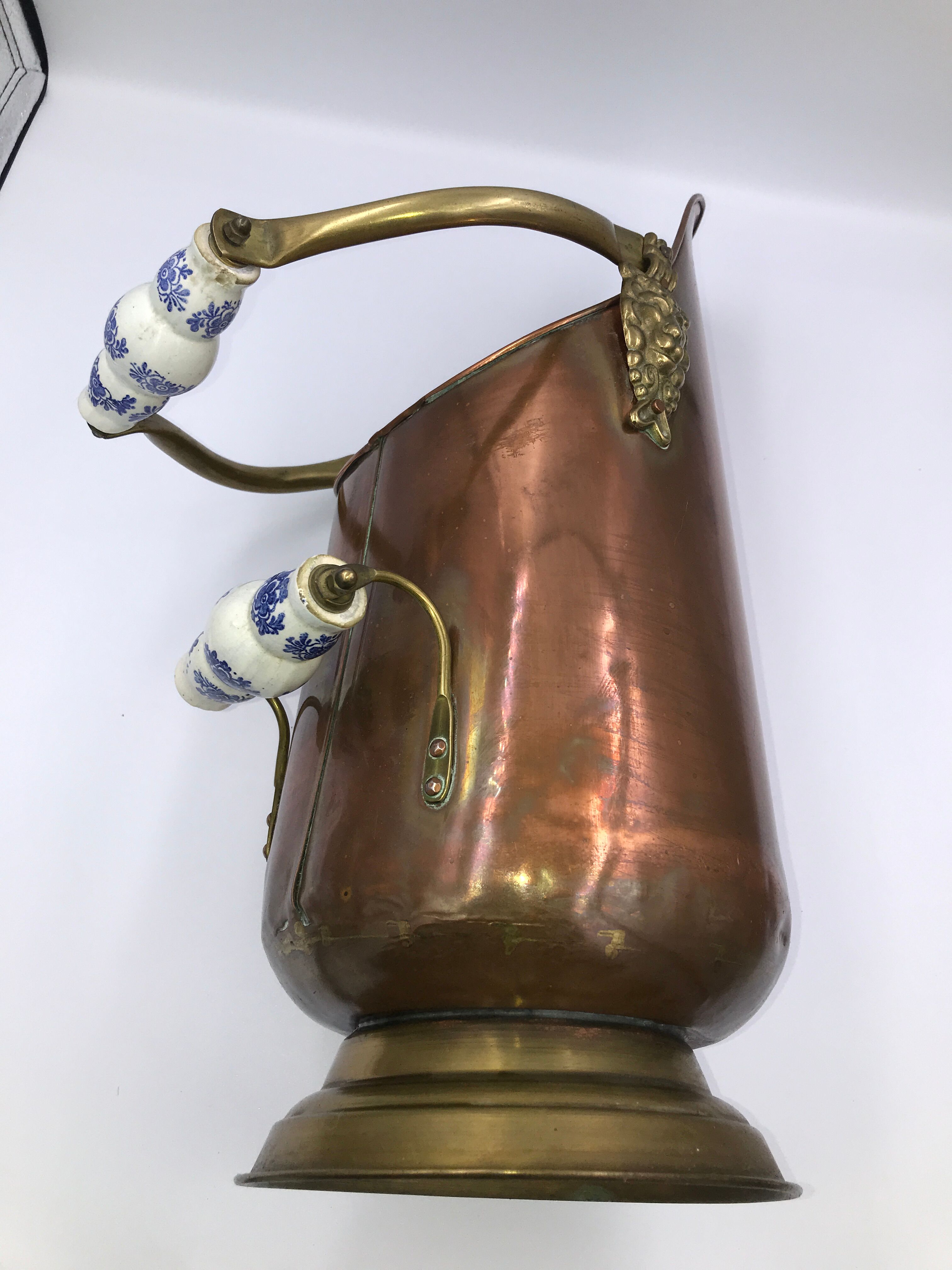 Copper umbrella holder and vintage porcelain handles