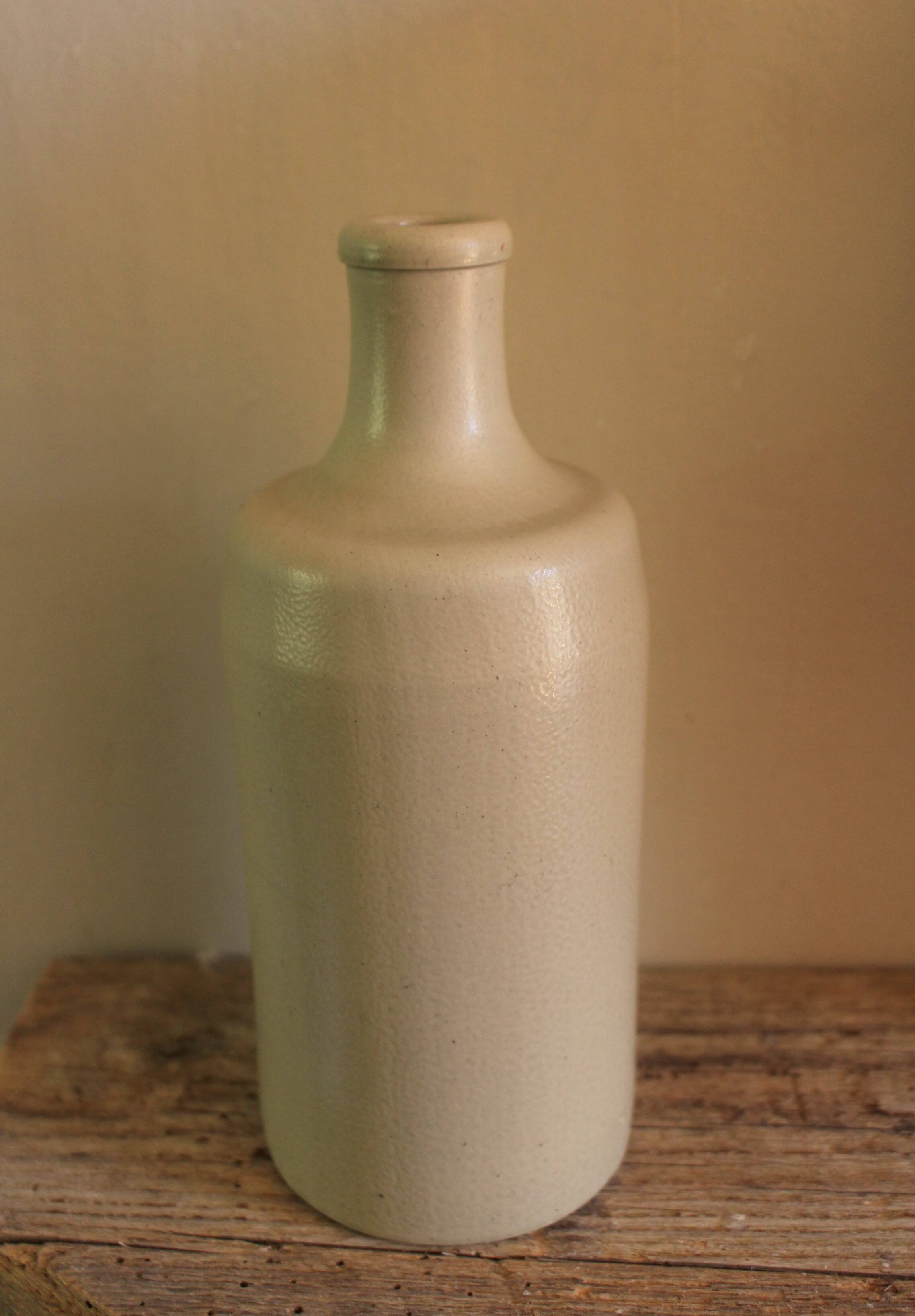 Vintage stoneware liqueur bottle