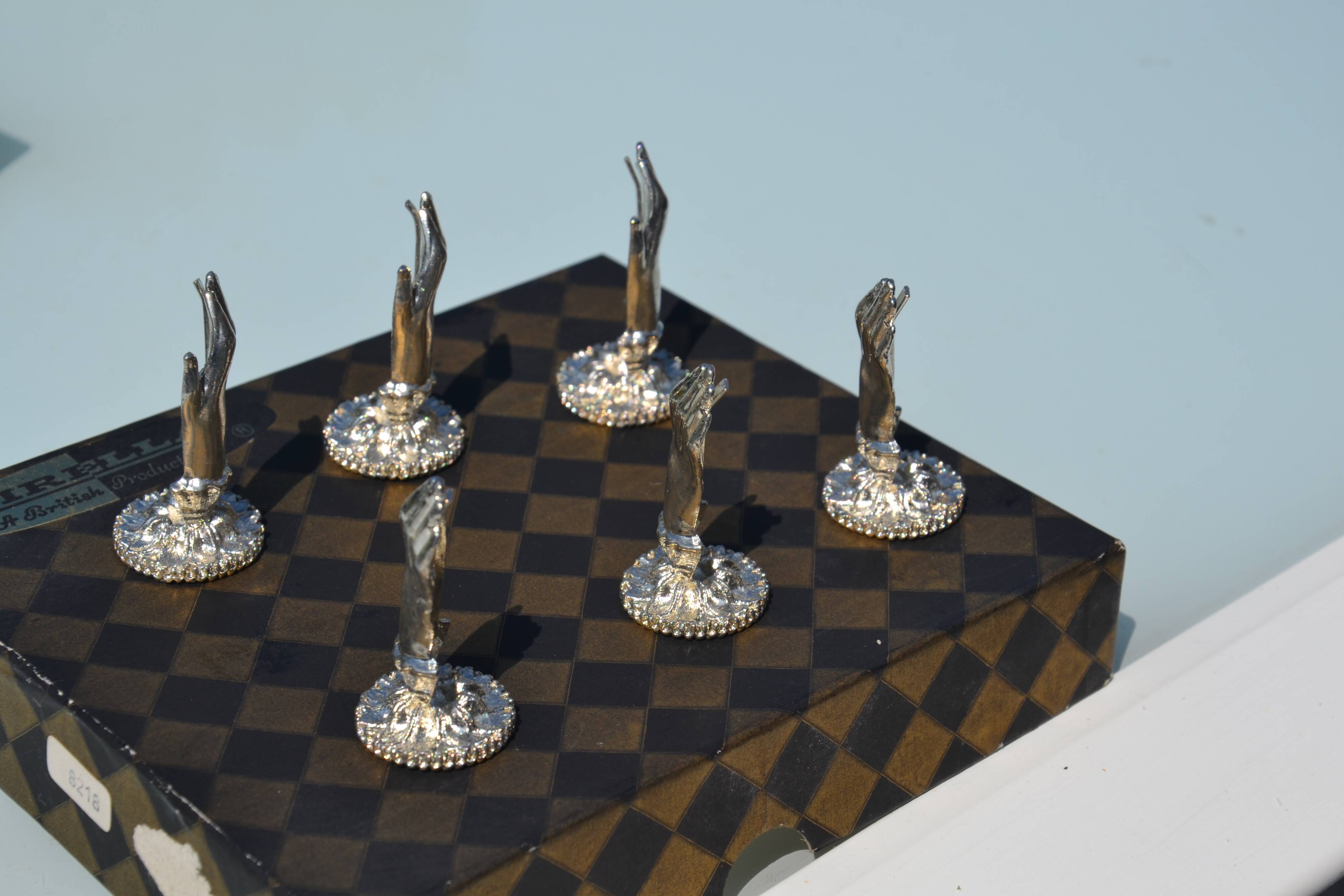 6 silver-plated menu holders A British production