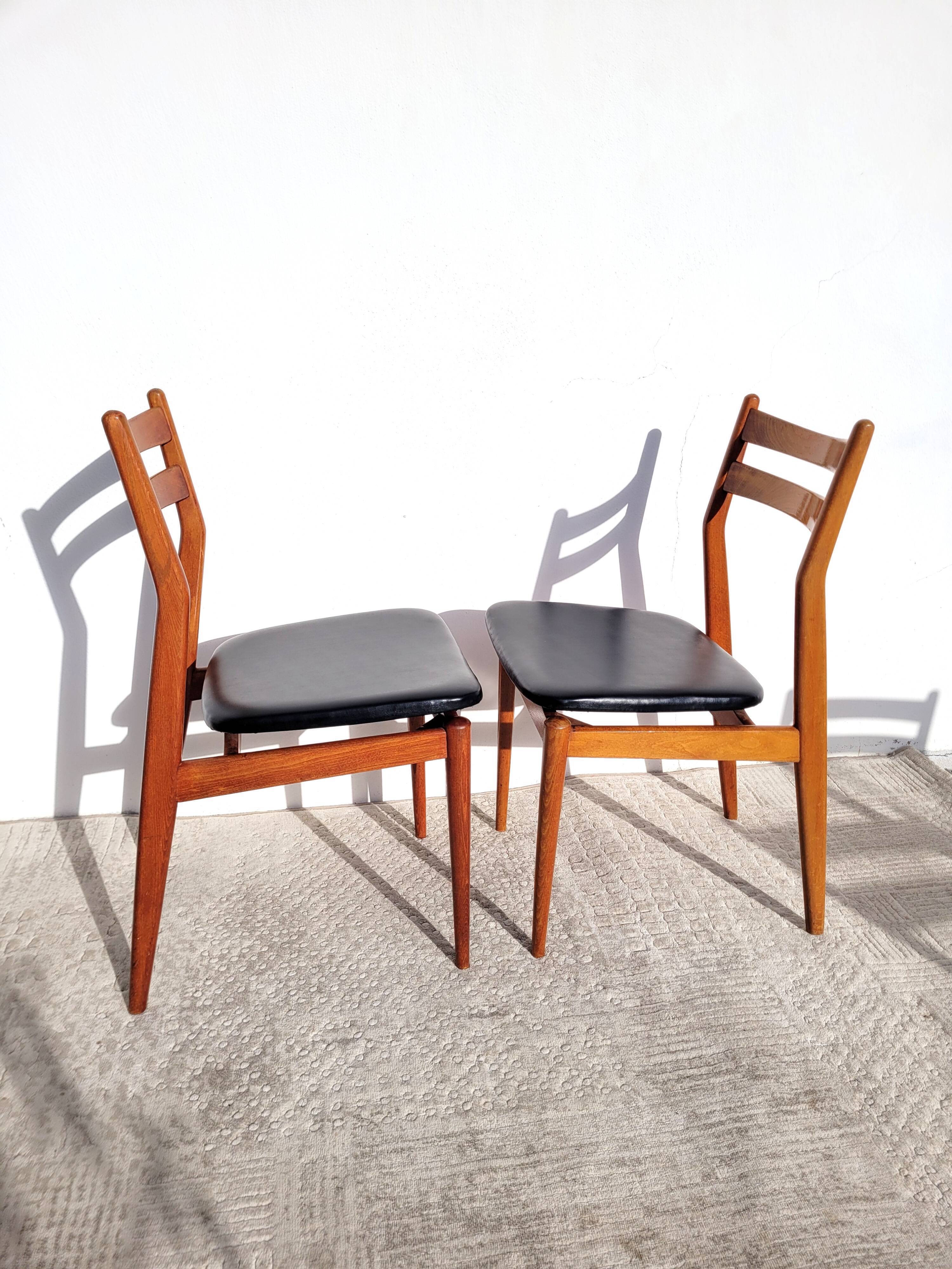 2 Scandinavian wooden chairs