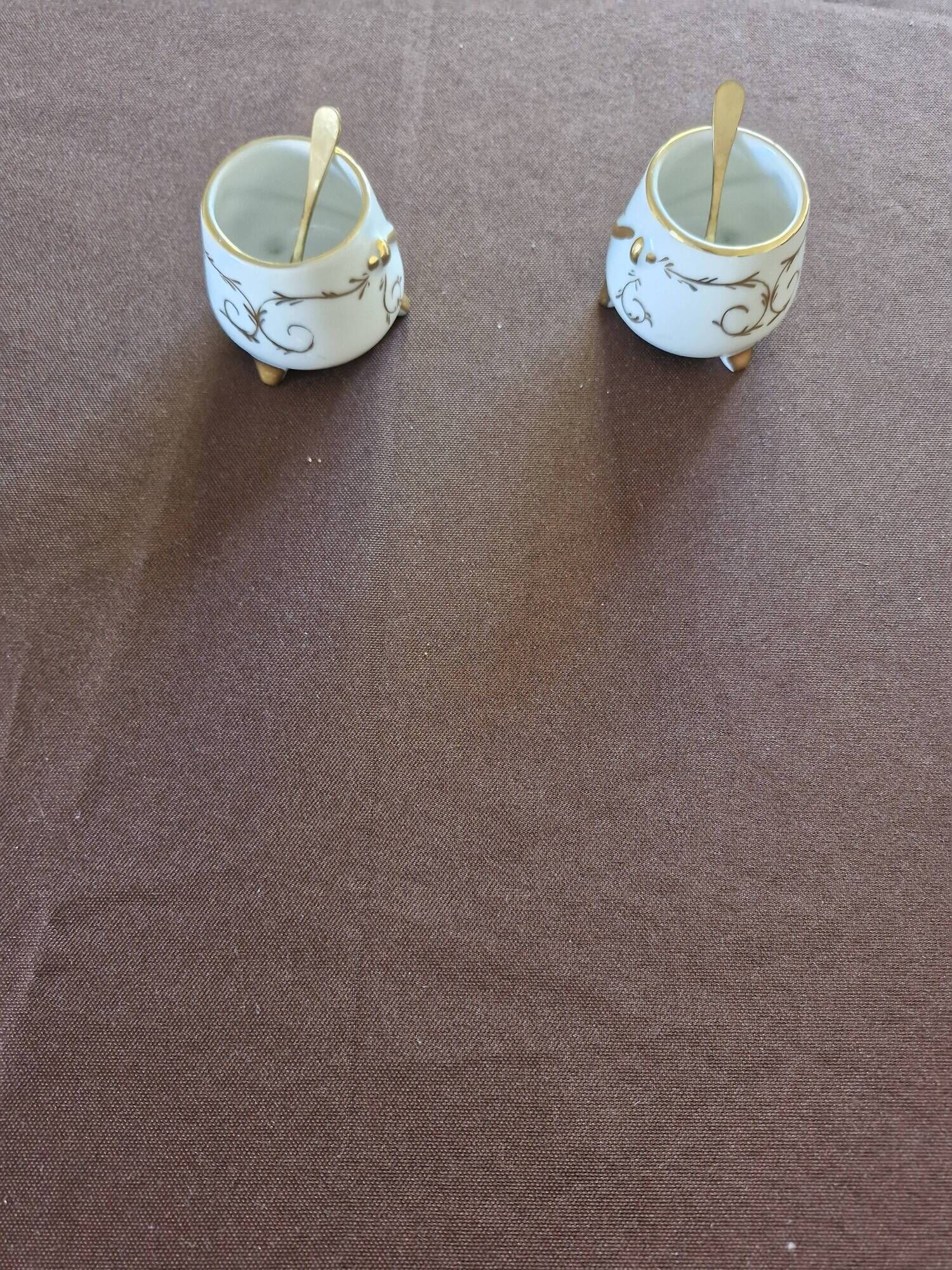 Vintage porcelain salt and pepper shakers.