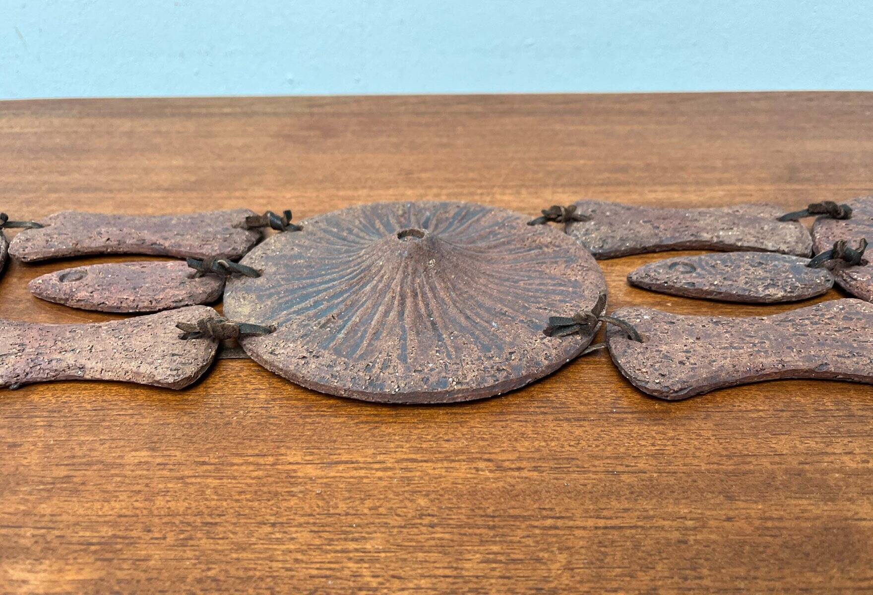 Wall suspension of Danish studio pottery in mid-century brutalist modernist style by Clara Helmich, 1979.