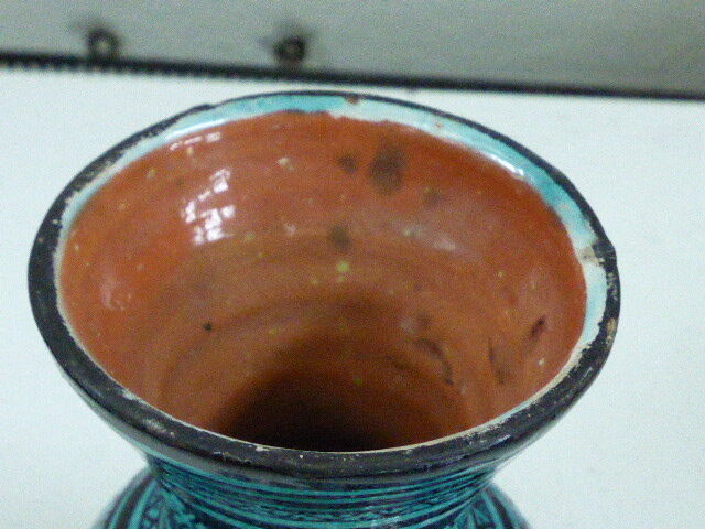 Nice oriental vase, black geometric patterns on blue background, vintage