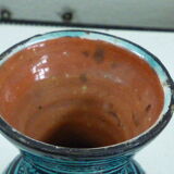 Nice oriental vase, black geometric patterns on blue background, vintage