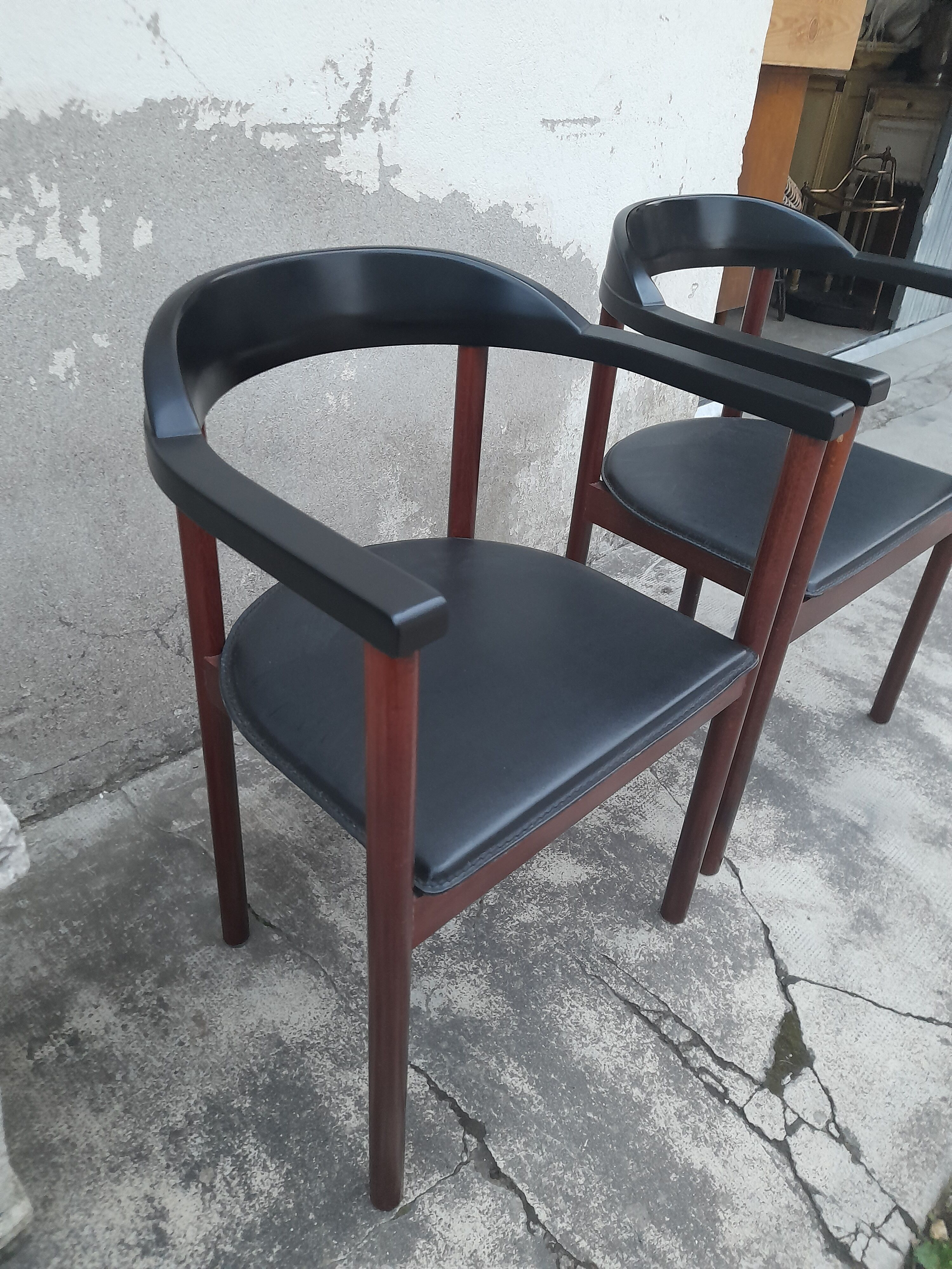 Pair of Scandinavian armchairs in teak and leather