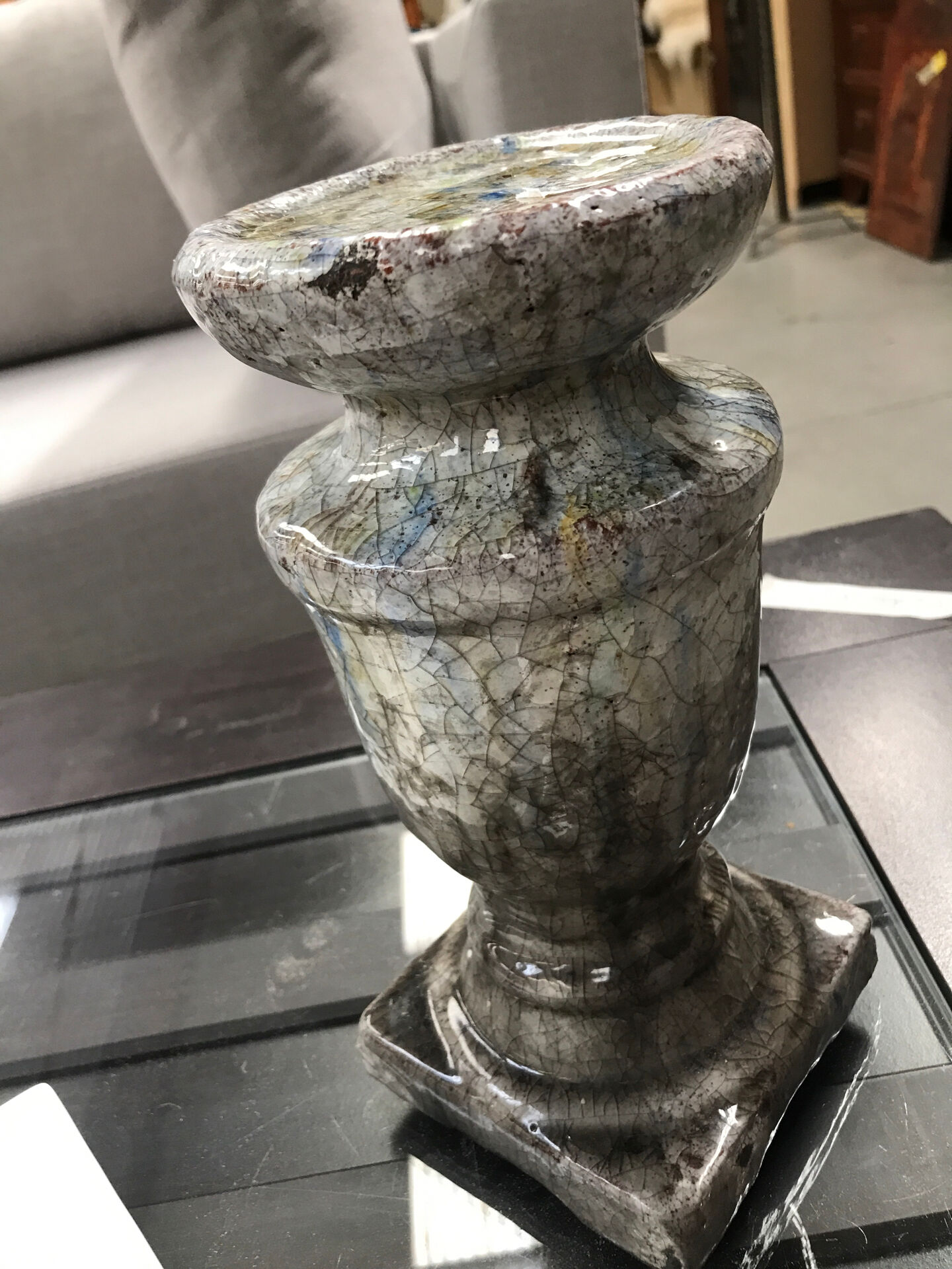 Ceramic candle holder in "Raku" style, blue-grey crackled.