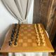 Chess set with wooden board and pieces