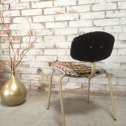 Vintage ethnic strafor tubular chair revisited with wax