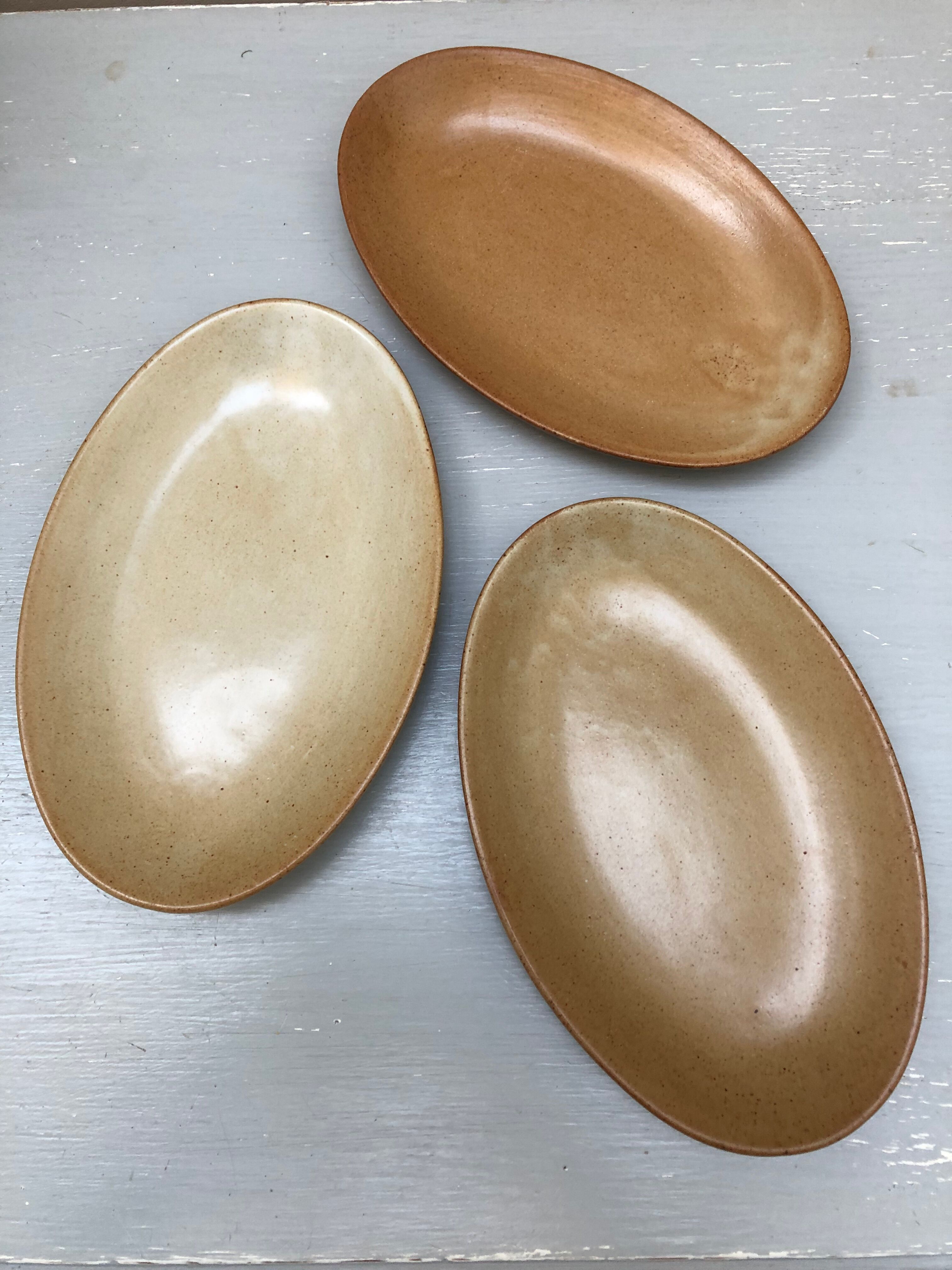 Set of three stoneware dishes village france