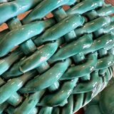 Vintage green earthenware plate/basket with fruit decorations.