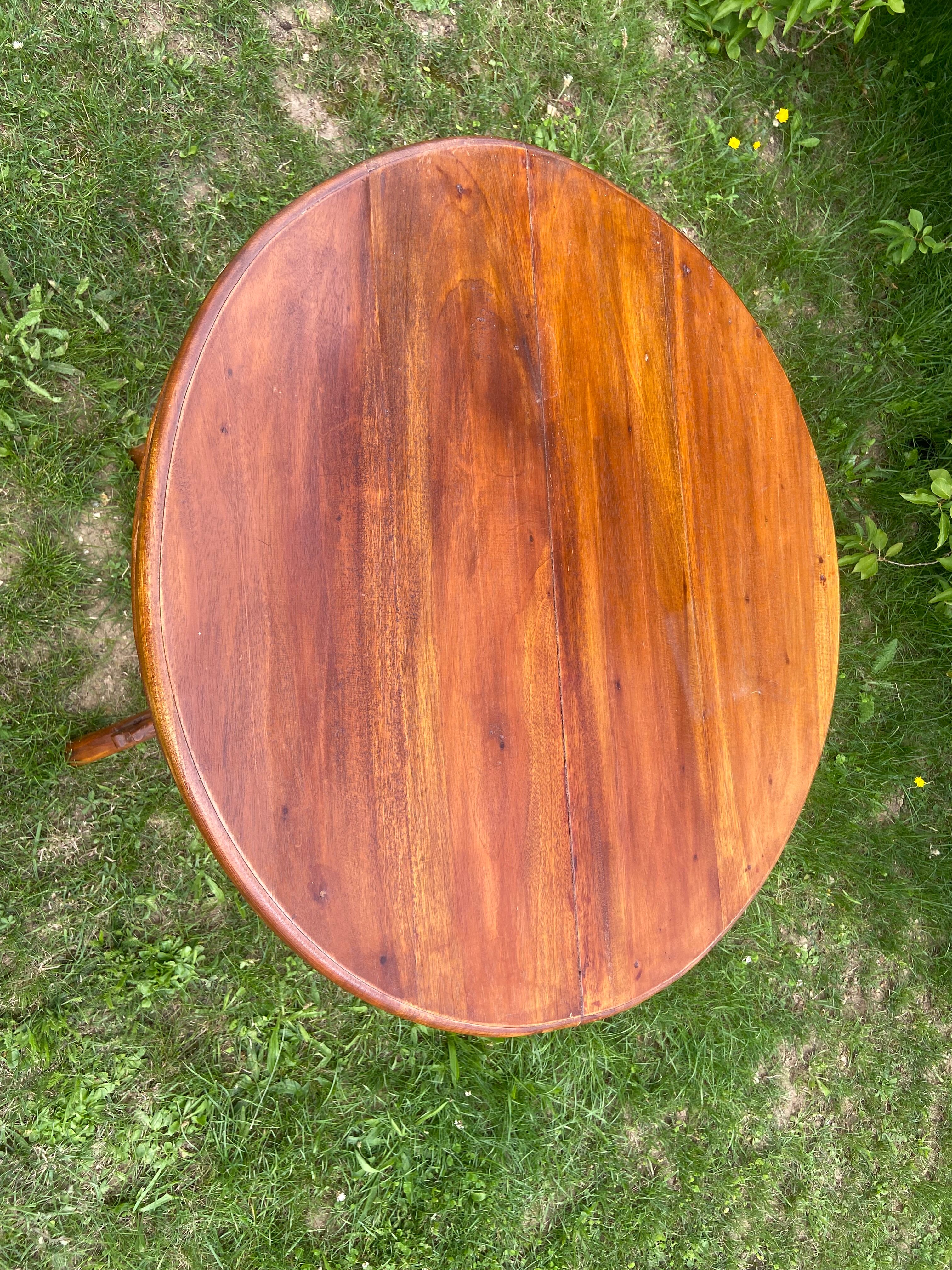 Round table and wrought iron chair