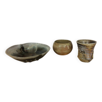 Three stoneware empty pockets with blue drips