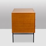 Chest of drawers in varnished blond cherry wood. 1960s.