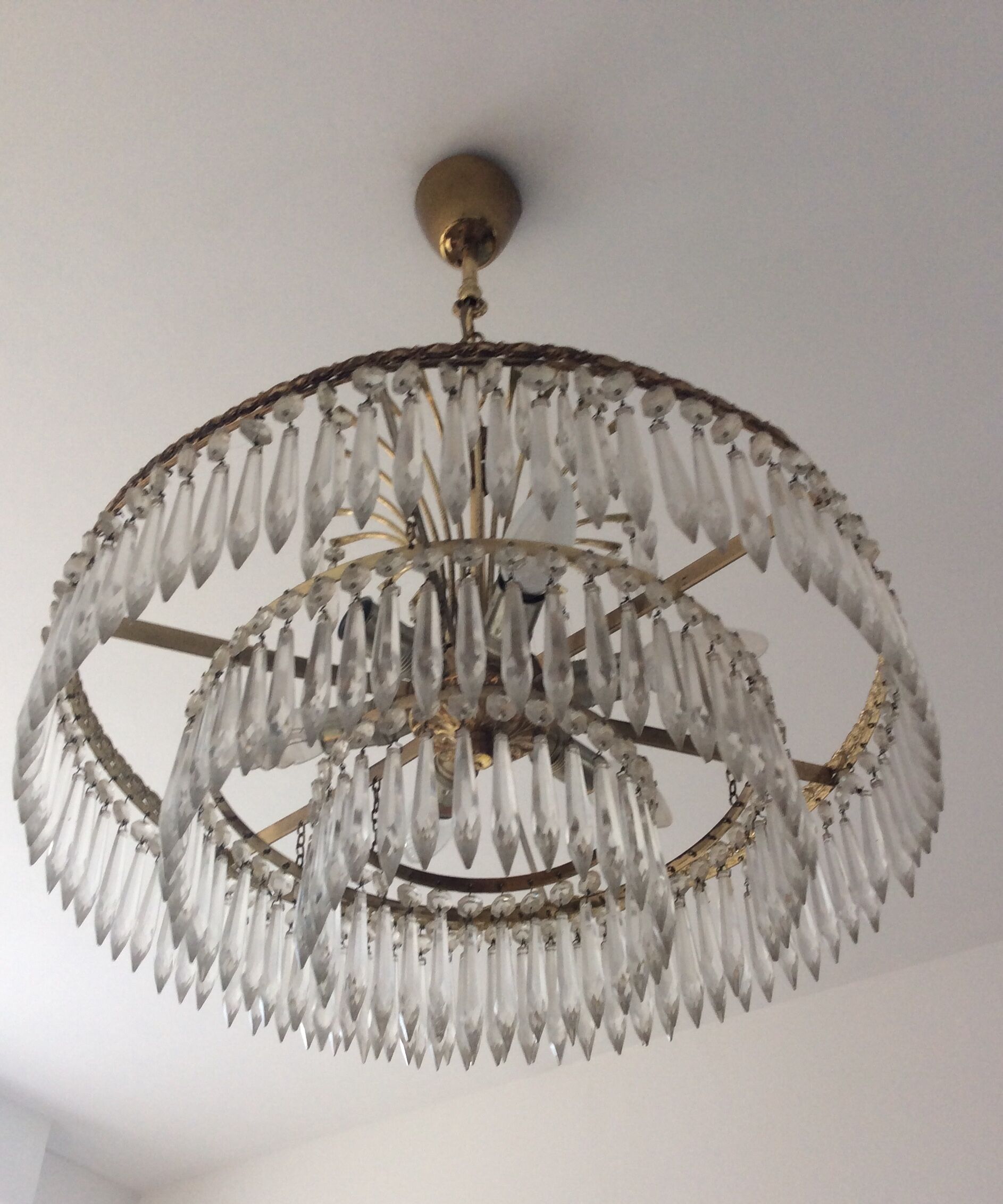 Old waterfall chandelier with grapevines and bronze