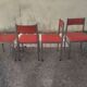 Set of 4 vintage chrome and orange faux leather chairs.
