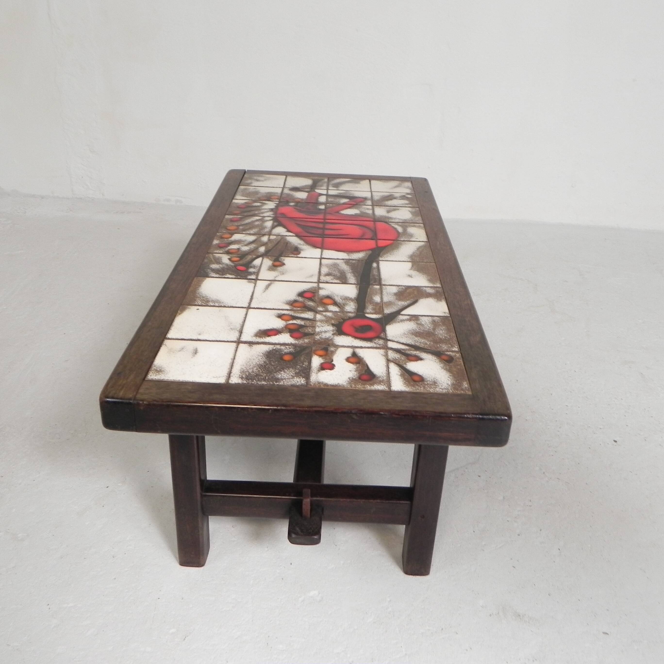 Square tile table from Vallauris, signed Dan with an image of a fantastic bird, 1960s.