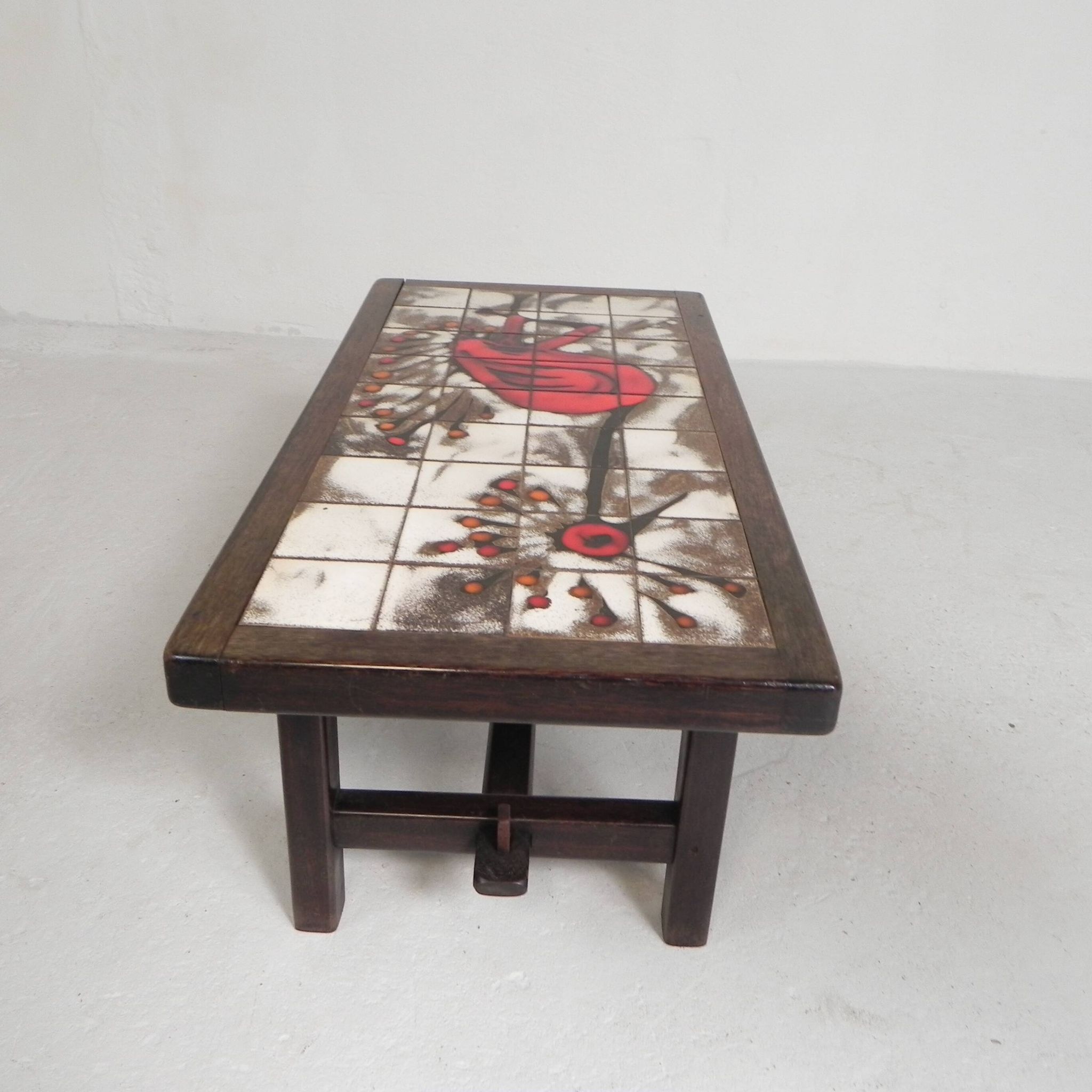 Square tile table from Vallauris, signed Dan with an image of a fantastic bird, 1960s.