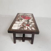 Square tile table from Vallauris, signed Dan with an image of a fantastic bird, 1960s.