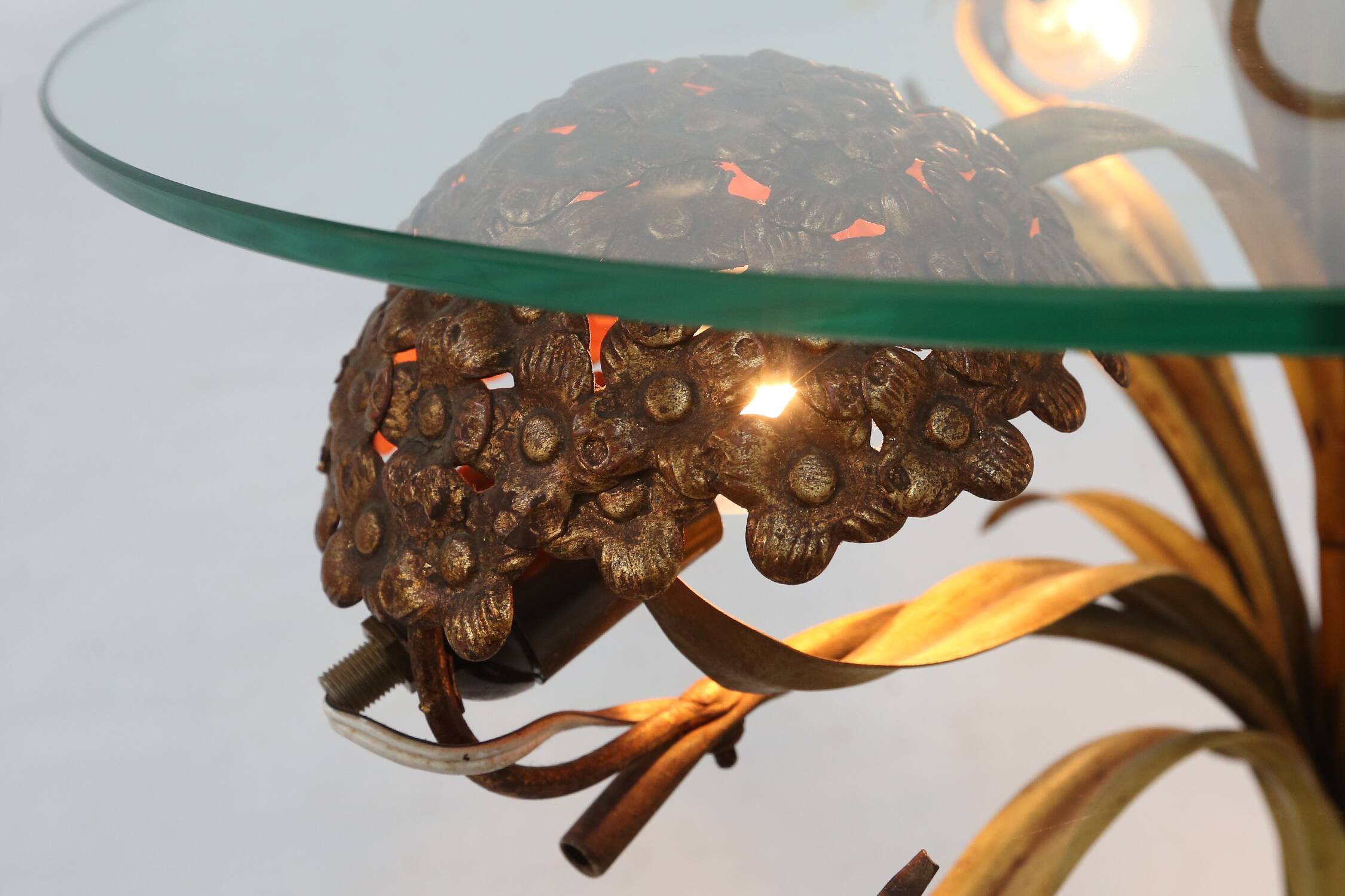 French Hollywood Regency style coffee table with lightning in brass flowers, 1950