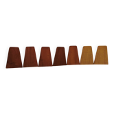 Set of 7 vintage bookends from the 1960s in teak/oak wood with metal feet.