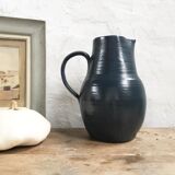 Old blue ceramic jug