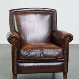 Vintage sheepskin armchair with beautiful warm colors and excellent seating comfort